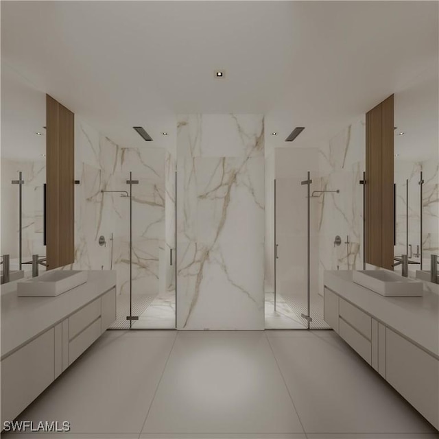 bathroom with vanity and an enclosed shower