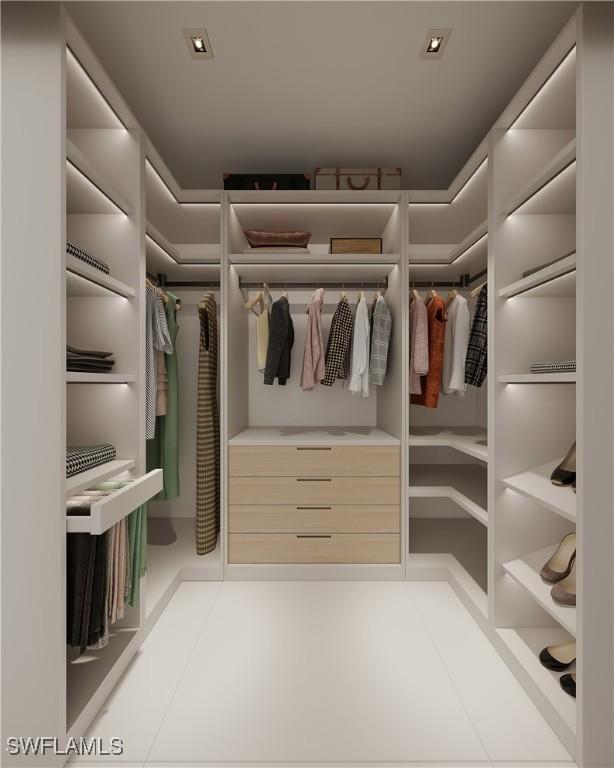 spacious closet with tile patterned flooring