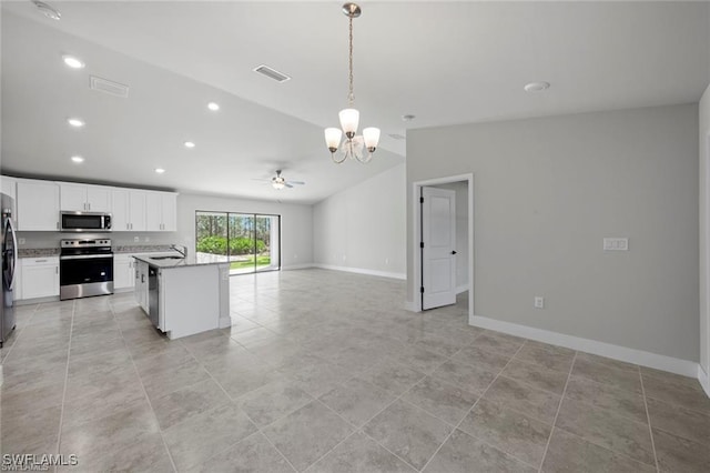 kitchen featuring pendant lighting, a center island with sink, ceiling fan with notable chandelier, white cabinetry, and stainless steel appliances