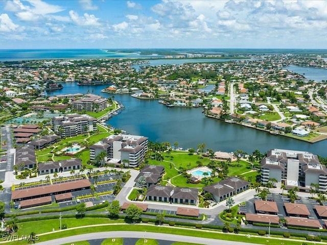 birds eye view of property featuring a water view