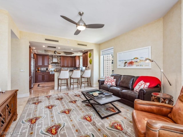 living room featuring ceiling fan