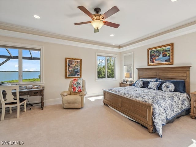 bedroom featuring ceiling fan, crown molding, and light carpet