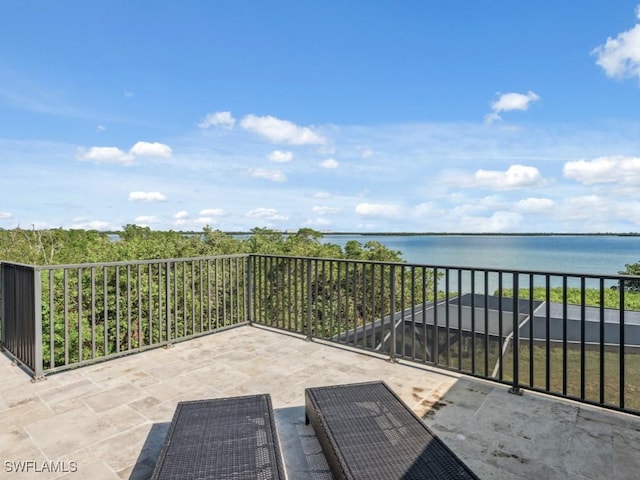 view of patio / terrace featuring a water view