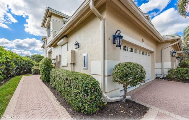 view of home's exterior with a garage