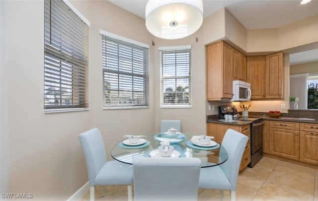 dining room with light tile patterned floors