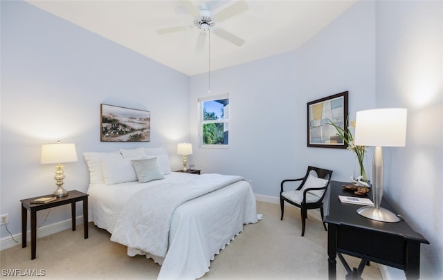 bedroom with ceiling fan and light colored carpet