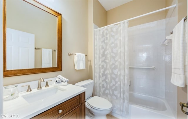 full bathroom featuring vanity, shower / tub combo with curtain, and toilet