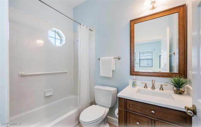 full bathroom with shower / tub combo, vanity, and toilet