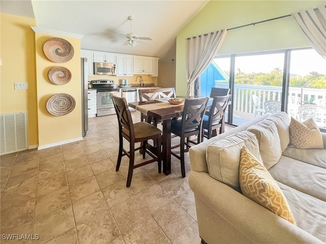 564 Coral Cir, Captiva, FL 33924 - dining space with ceiling fan and high vaulted ceiling