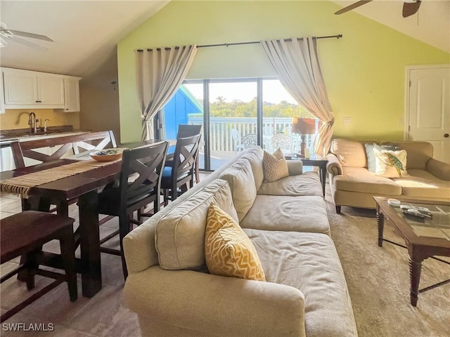 564 Coral Cir, Captiva, FL 33924 - living room featuring a ceiling fan, light colored carpet, and high vaulted ceiling