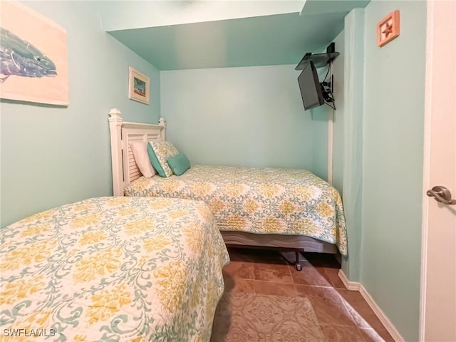 564 Coral Cir, Captiva, FL 33924 - bedroom with tile patterned flooring