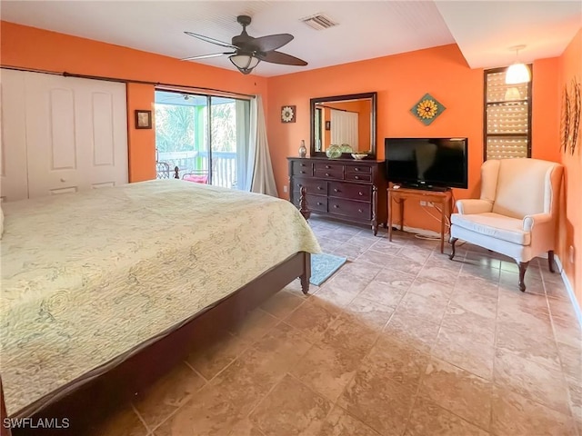 564 Coral Cir, Captiva, FL 33924 - bedroom featuring access to exterior and a ceiling fan