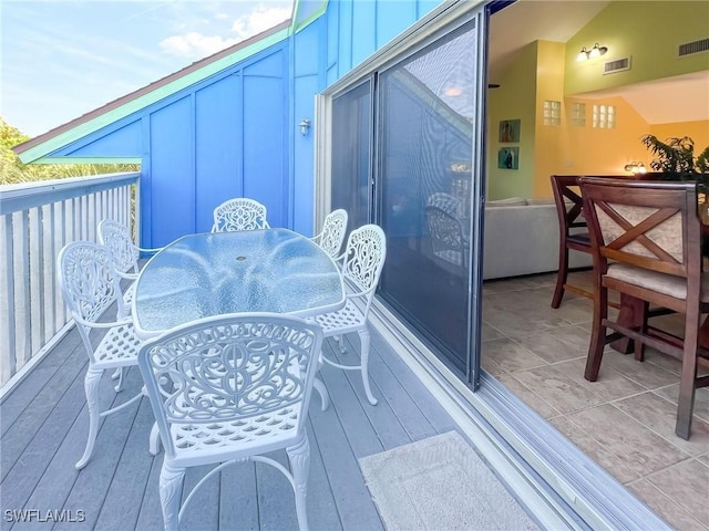 564 Coral Cir, Captiva, FL 33924 - deck with outdoor dining space