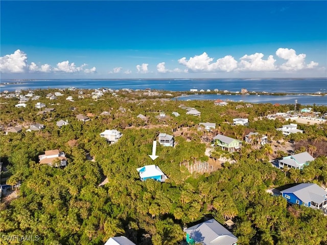 564 Coral Cir, Captiva, FL 33924 - aerial overview of property's location featuring a nearby body of water and nearby suburban area