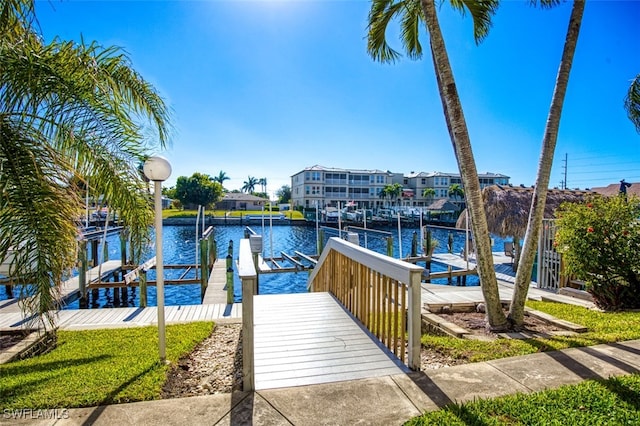 dock area featuring a water view