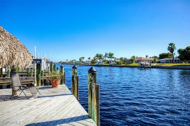 view of dock with a water view