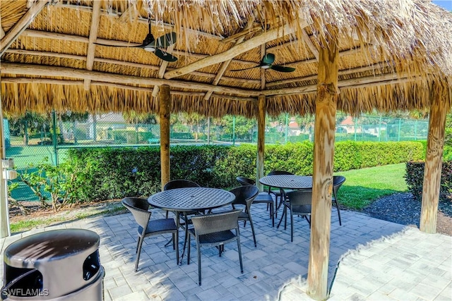 view of patio / terrace featuring a gazebo and ceiling fan