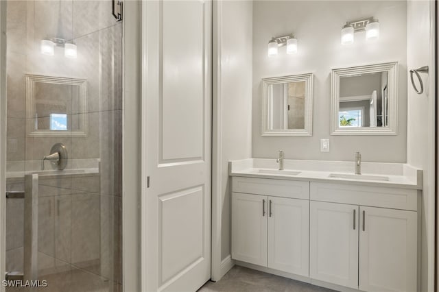 bathroom featuring vanity and walk in shower