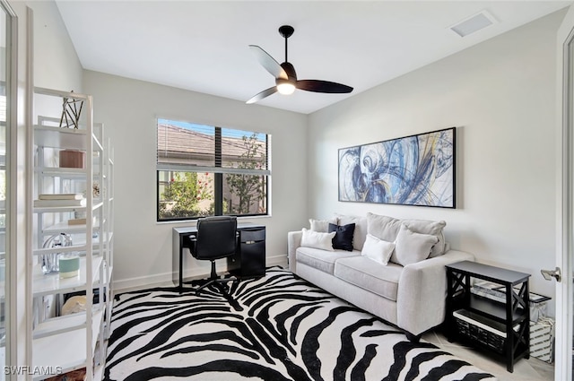 living room featuring ceiling fan