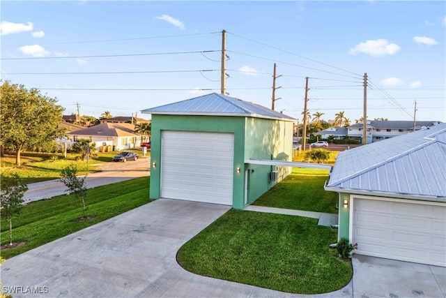 garage with a lawn