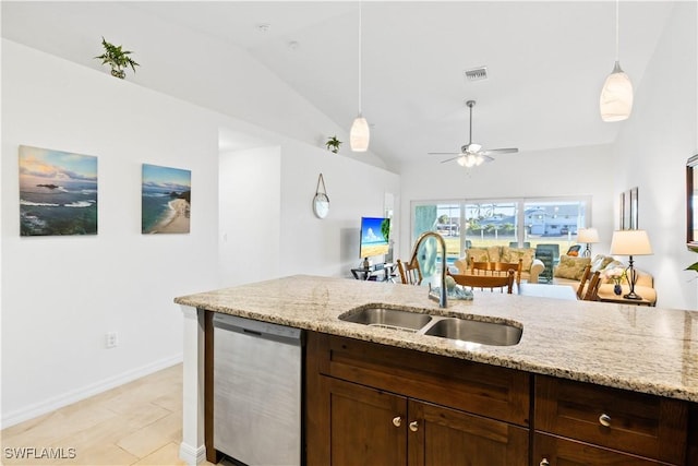 kitchen with ceiling fan, sink, decorative light fixtures, dishwasher, and lofted ceiling