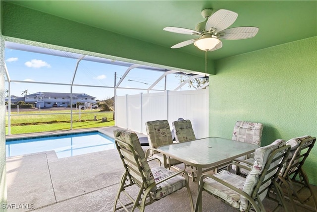 interior space with ceiling fan and a lanai