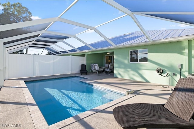 view of pool featuring a patio and a lanai