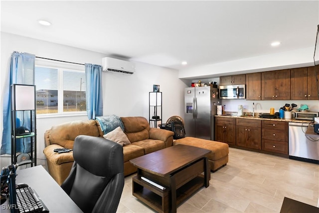 living room with a wall unit AC and sink