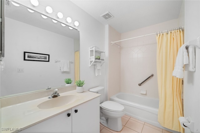 full bathroom with vanity, toilet, tile patterned flooring, and shower / bath combo