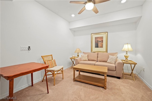 living room featuring light colored carpet and ceiling fan