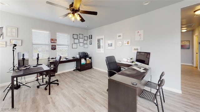 office area with ceiling fan and light wood-type flooring