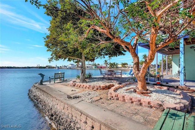 dock area featuring a water view