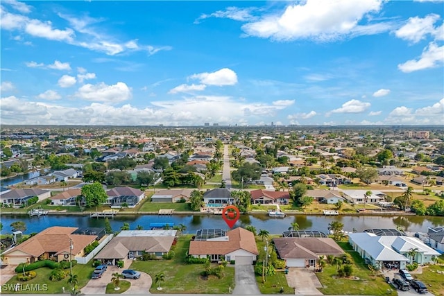 drone / aerial view featuring a water view