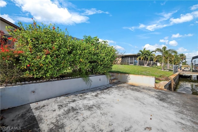 view of patio / terrace featuring a water view