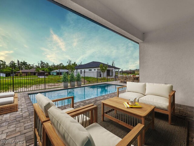 view of swimming pool featuring a patio and an outdoor hangout area