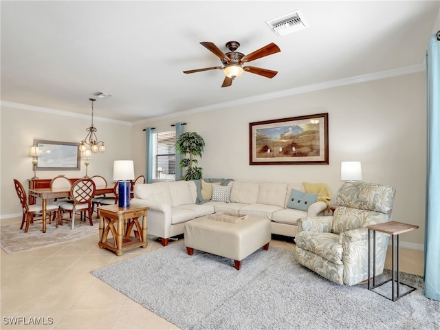 tiled living room featuring ceiling fan with notable chandelier and crown molding