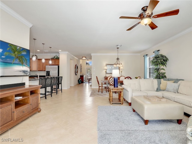 living room featuring ceiling fan and ornamental molding