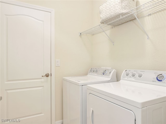 laundry area featuring washer and clothes dryer