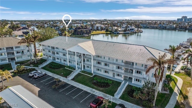 drone / aerial view with a water view