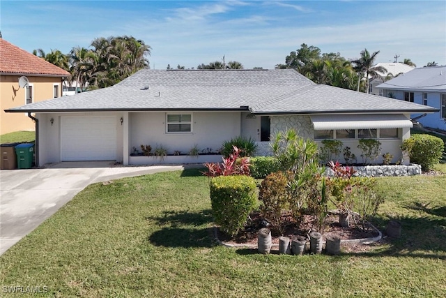 view of front facade featuring a garage and a front yard