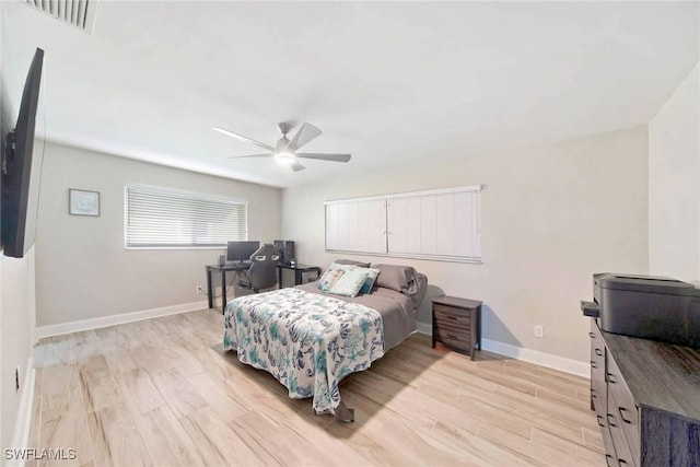 bedroom featuring light hardwood / wood-style flooring and ceiling fan