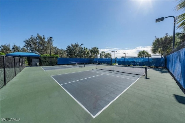 view of sport court featuring basketball hoop