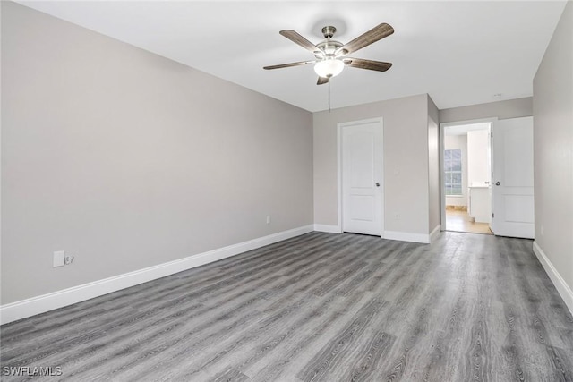 4490 10th St NE, Naples, FL 34120 - unfurnished bedroom with wood finished floors and ceiling fan