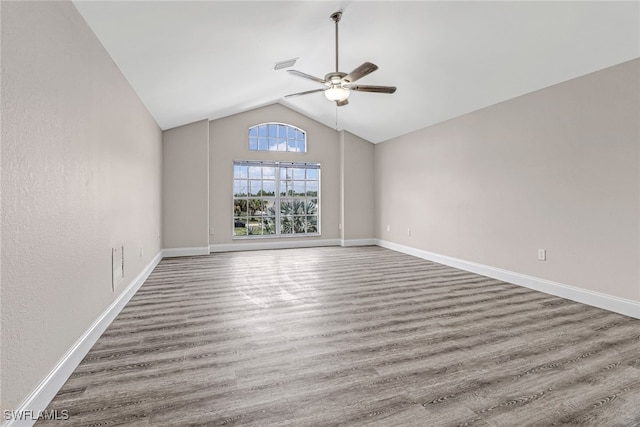 4490 10th St NE, Naples, FL 34120 - empty room featuring a ceiling fan, wood finished floors, and lofted ceiling