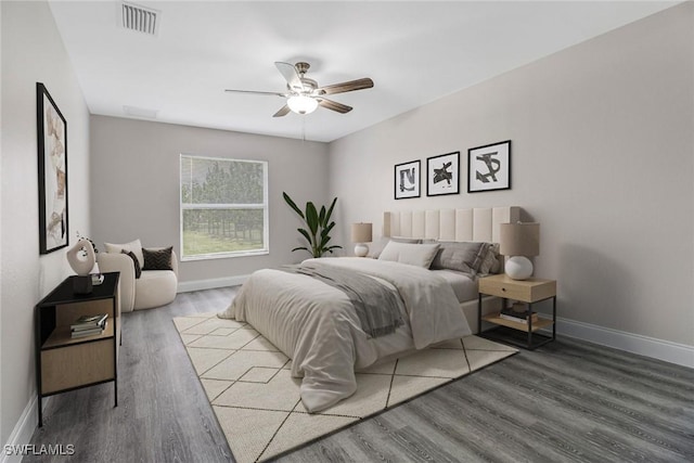 bedroom with hardwood / wood-style floors and ceiling fan