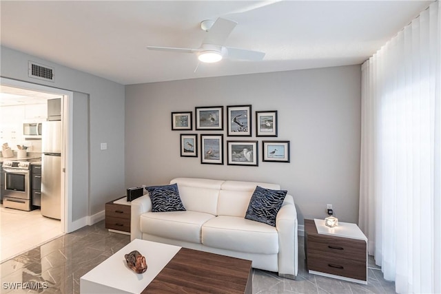 living room with ceiling fan