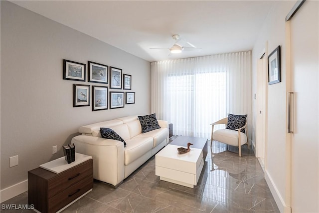 living room with ceiling fan