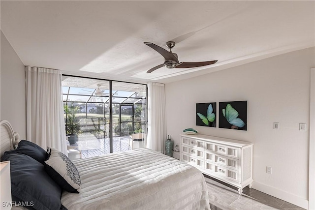 16454 Timberlakes Dr Unit 103, Fort Myers, FL 33908 - bedroom with a sunroom, ceiling fan, access to exterior, and baseboards