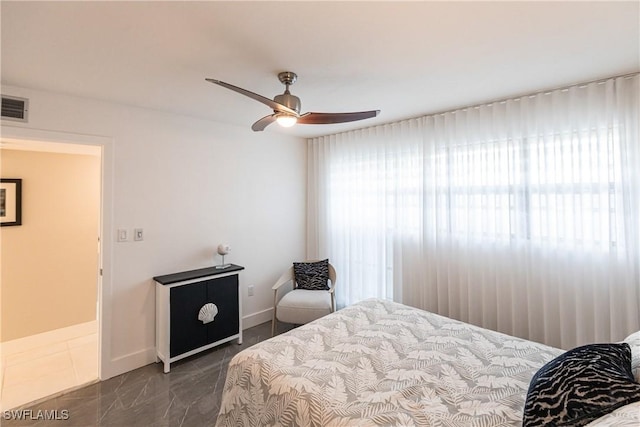 bedroom featuring ceiling fan