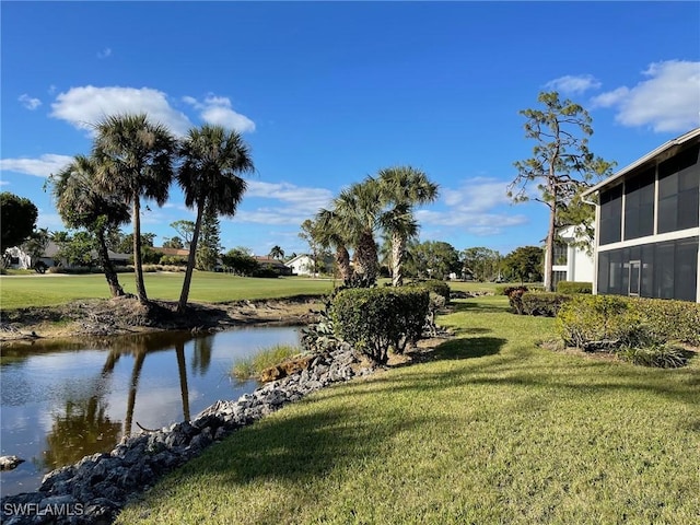 exterior space with a water view